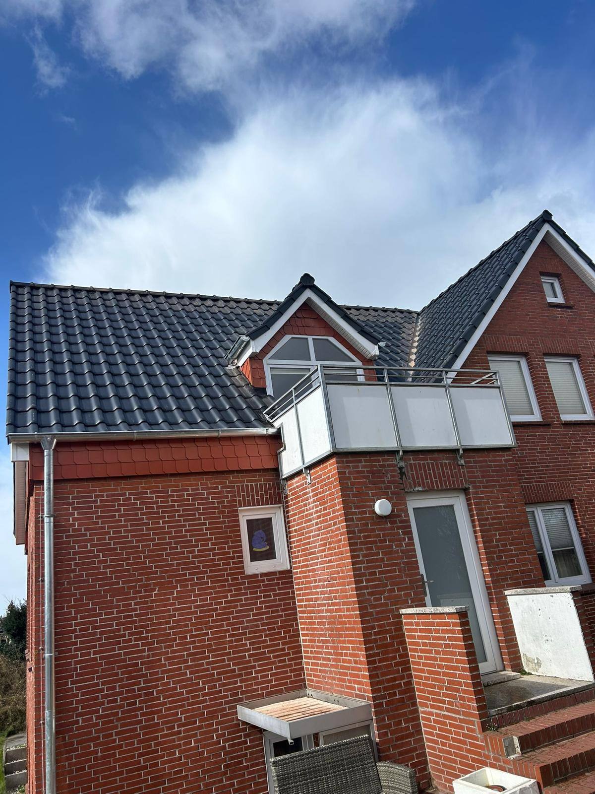 Dachsanierung mit Dachbalkon Dachdeckerei Deerberg